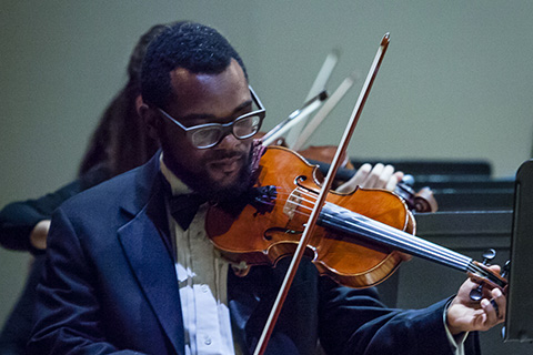 Violinist plays with the FROST Symphony Orchestra